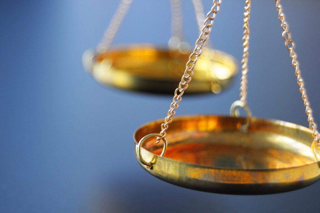 scale or scales with copyspace showing law justice or legal concept
